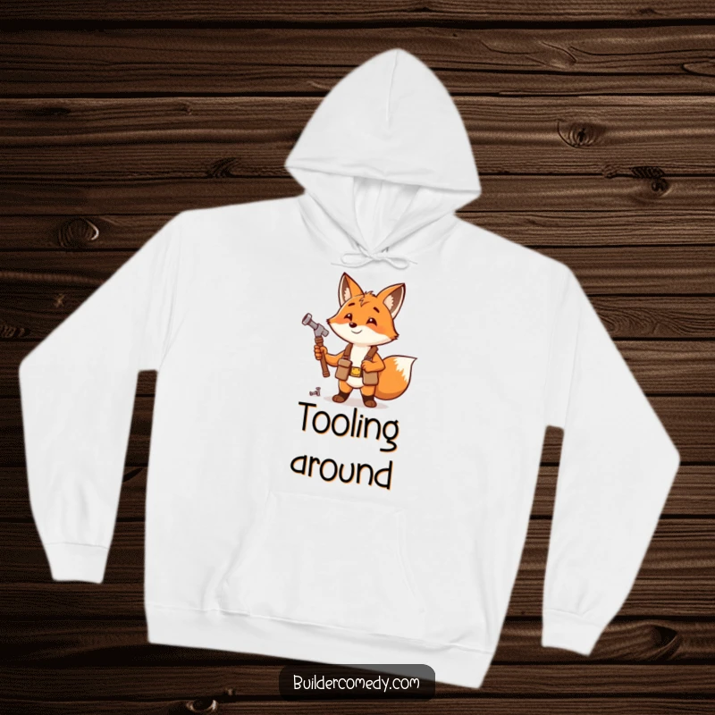 Funny fox with tool belt hammering a nail, cozy hoodie for handy folks.